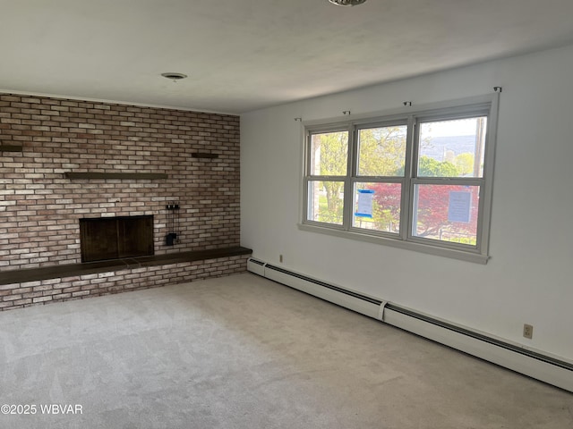 unfurnished living room featuring a baseboard radiator, carpet flooring, and a brick fireplace