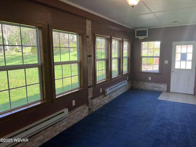unfurnished sunroom with a baseboard radiator