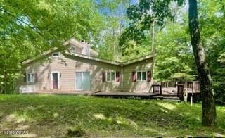 10296 Renovo Rd, North Bend, PA 17760 - rear view of property featuring a wooden deck and a lawn
