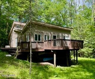 10296 Renovo Rd, North Bend, PA 17760 - rear view of property featuring a wooden deck and a lawn