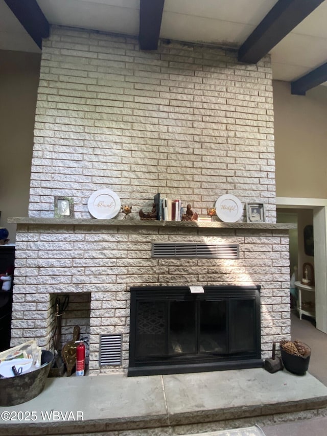 10296 Renovo Rd, North Bend, PA 17760 - detailed view of beamed ceiling, a fireplace, and a fire extinguisher