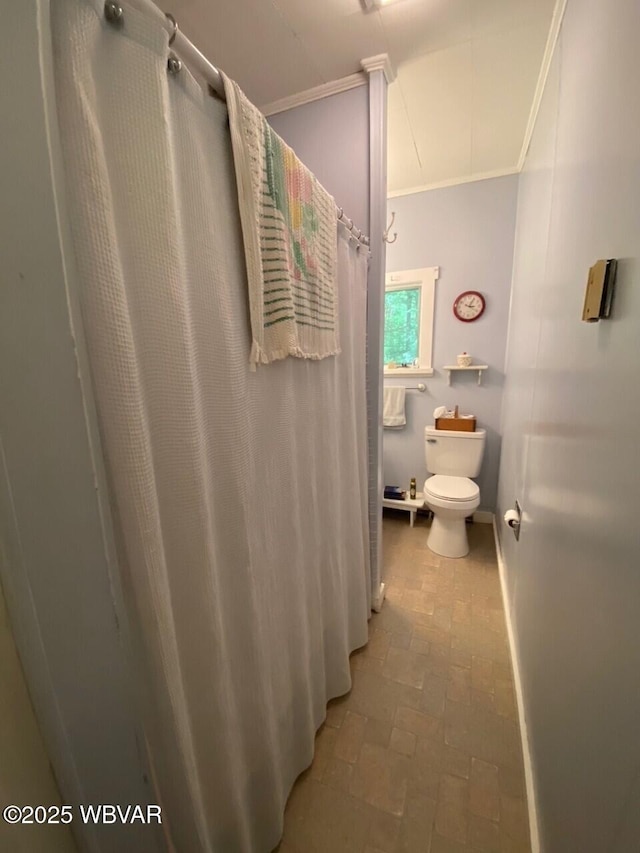 10296 Renovo Rd, North Bend, PA 17760 - bathroom featuring crown molding, brick patterned flooring, toilet, and a shower with shower curtain