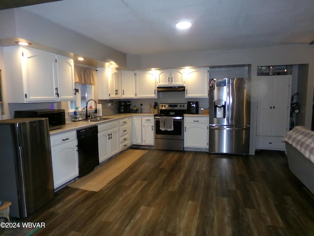 kitchen featuring white cabinets, appliances with stainless steel finishes, dark hardwood / wood-style floors, and sink