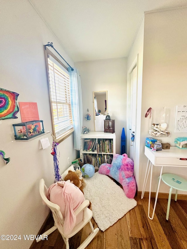 bedroom featuring hardwood / wood-style floors