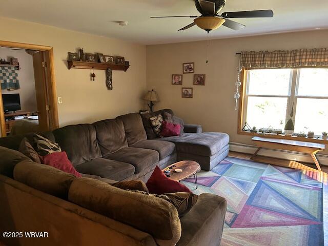 5477 Bloomingrove Rd, Cogan Station, PA 17728 - living room with ceiling fan