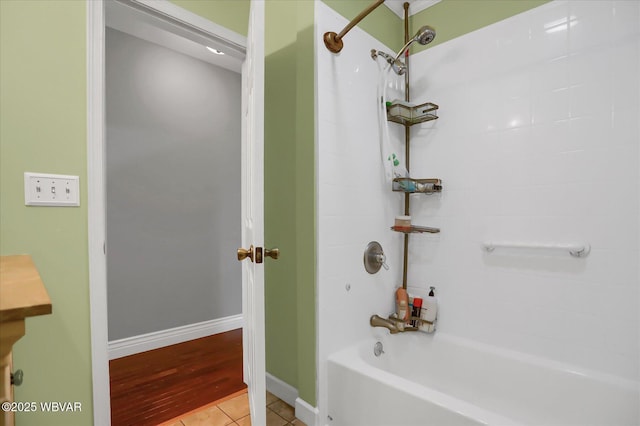 bathroom featuring tile patterned floors and shower / bathing tub combination