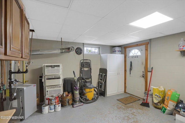 interior space with a paneled ceiling