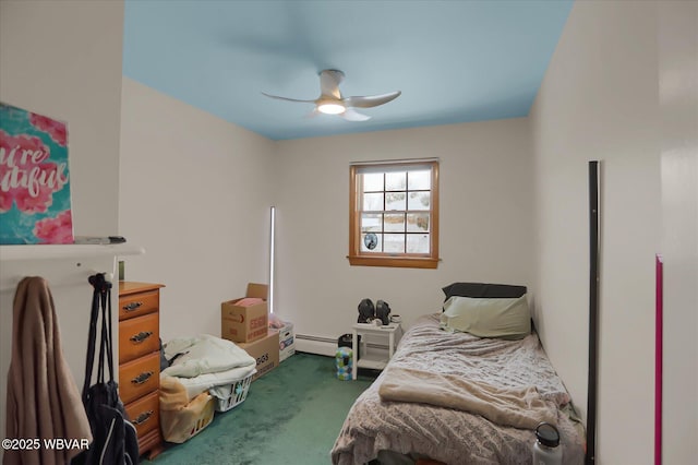 carpeted bedroom featuring ceiling fan and a baseboard radiator