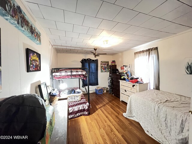 bedroom featuring hardwood / wood-style floors