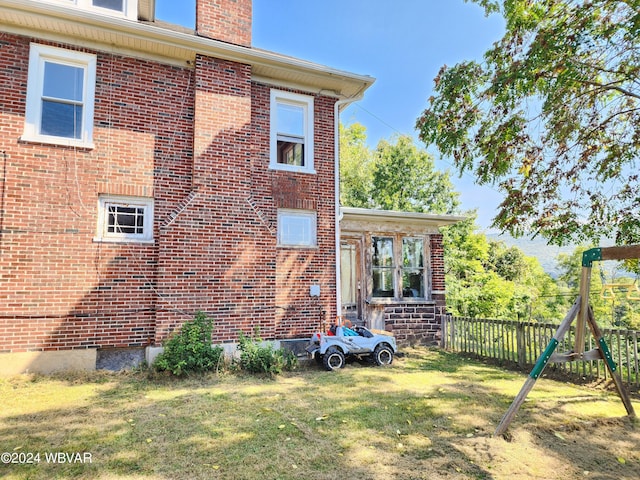 view of home's exterior featuring a lawn