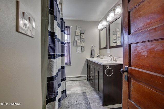 104 Pearl St, Lock Haven, PA 17745 - full bath with baseboard heating, double vanity, wood finished floors, and a shower with curtain