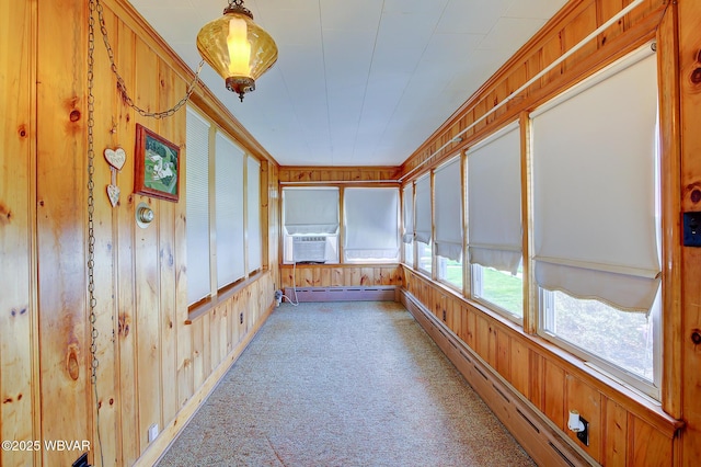 104 Pearl St, Lock Haven, PA 17745 - unfurnished sunroom featuring a baseboard heating unit, wooden walls, carpet floors, cooling unit, and baseboard heating
