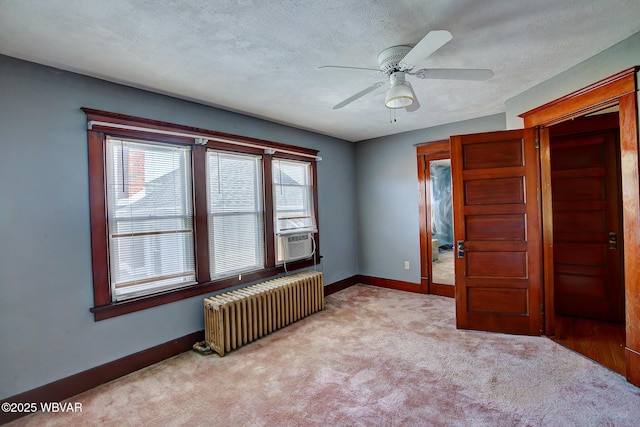 104 Pearl St, Lock Haven, PA 17745 - spare room with radiator heating unit, a ceiling fan, carpet flooring, baseboards, and cooling unit