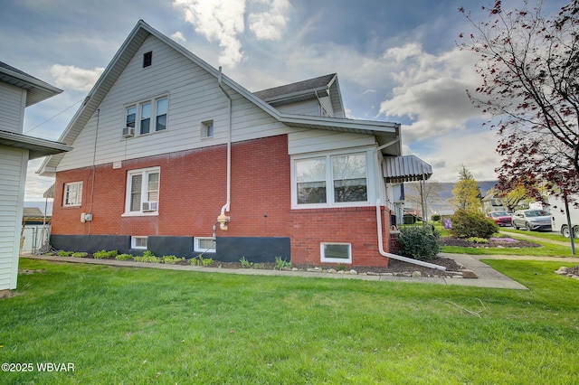 104 Pearl St, Lock Haven, PA 17745 - view of side of home featuring brick siding and a yard