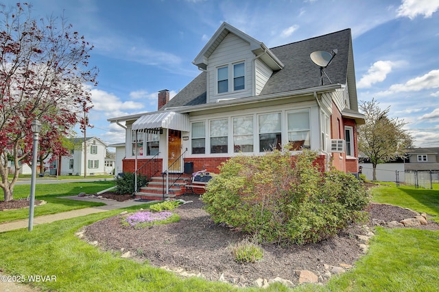 104 Pearl St, Lock Haven, PA 17745 - view of front facade featuring brick siding, a shingled roof, entry steps, and a chimney