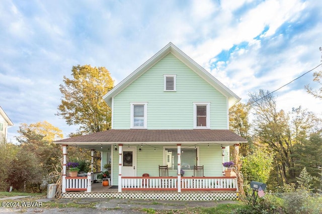 farmhouse inspired home featuring a porch