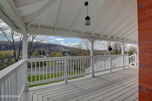 wooden terrace with a mountain view