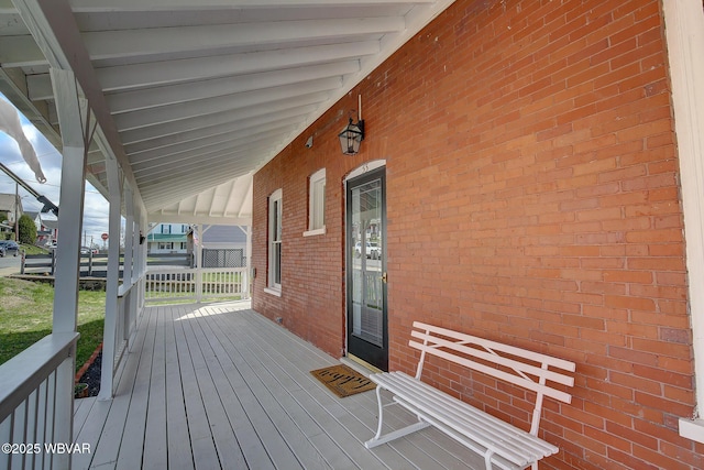 wooden deck featuring a porch