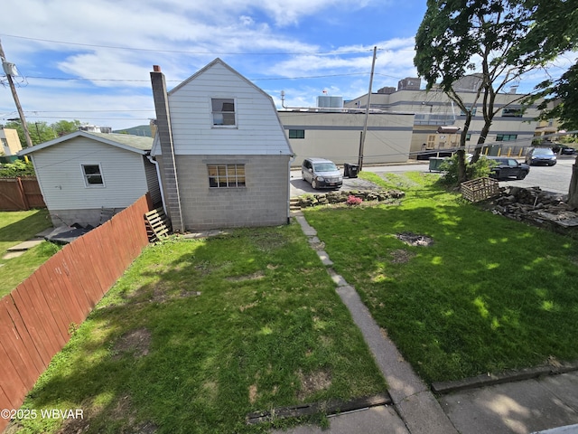 1013 Allegheny St, Jersey Shore, PA 17740 - back of house featuring brick siding and a gambrel roof