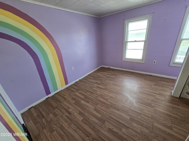 1013 Allegheny St, Jersey Shore, PA 17740 - empty room with wood finished floors, baseboards, and ornamental molding