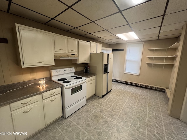 kitchen featuring white appliances, baseboard heating, and a paneled ceiling