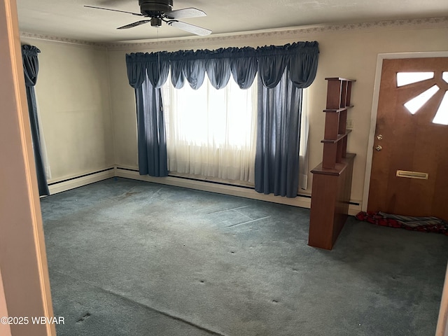 entryway featuring dark colored carpet, ceiling fan, and a baseboard radiator