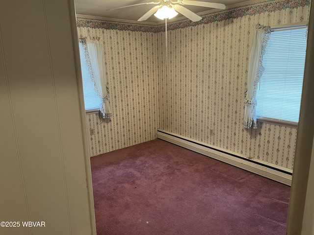 spare room with carpet flooring, ornamental molding, ceiling fan, and a baseboard heating unit