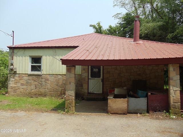 5801 N Rt 220th Hwy, Linden, PA 17744 - view of front of house featuring stone siding and metal roof