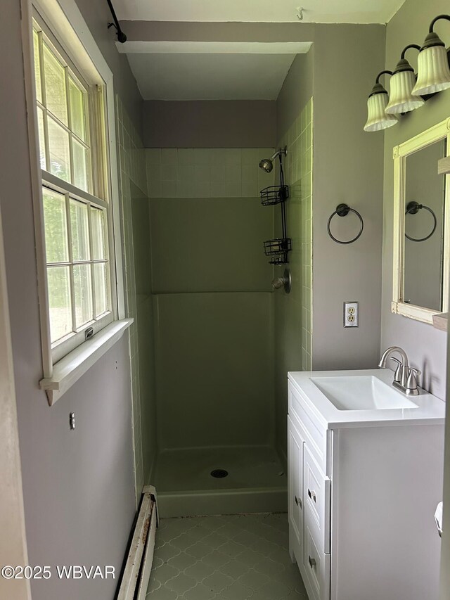575 Steele Hill Rd, Sugar Run, PA 18846 - bathroom with a baseboard radiator, tile patterned flooring, a shower, and vanity