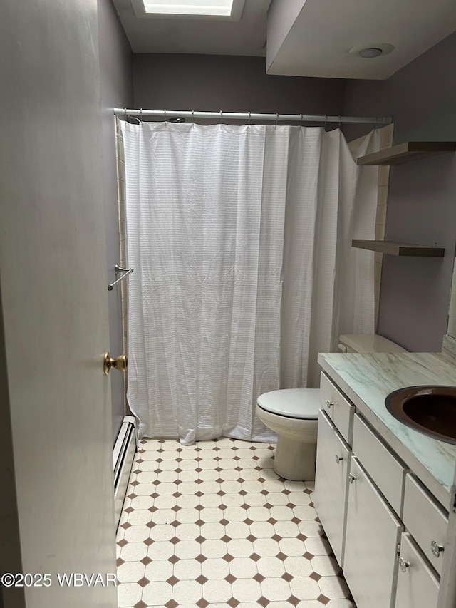 575 Steele Hill Rd, Sugar Run, PA 18846 - bathroom with a baseboard radiator, a shower with shower curtain, toilet, vanity, and tile patterned floors
