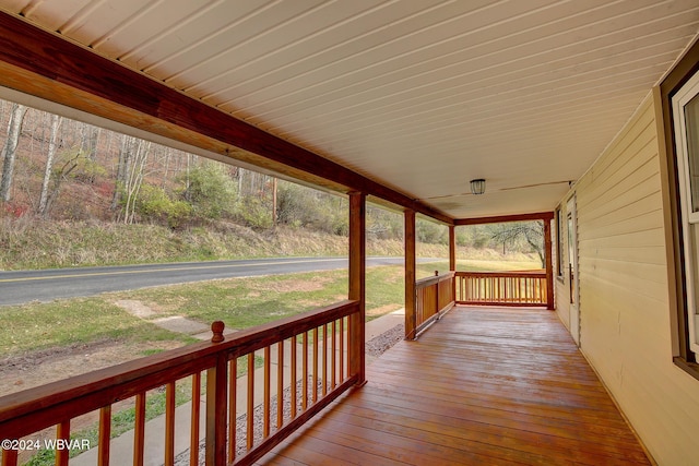 wooden terrace with covered porch