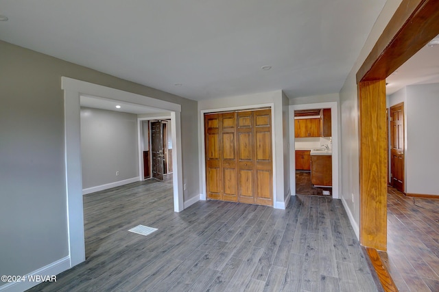 spare room with light hardwood / wood-style flooring and sink