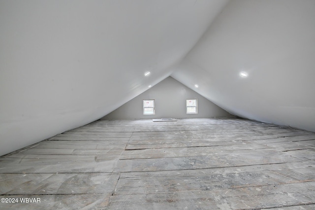 additional living space with lofted ceiling