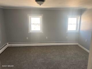 carpeted empty room with a wealth of natural light, crown molding, baseboards, and a baseboard radiator