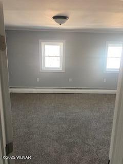 empty room with baseboards