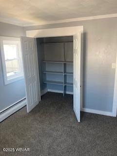 closet featuring a baseboard radiator