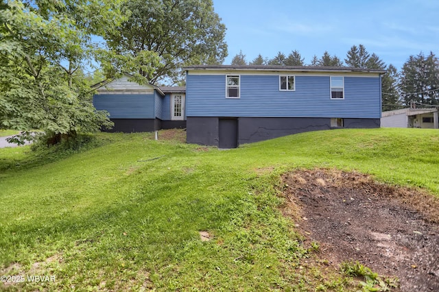 4792 Muncy Exchange Rd, Turbotville, PA 17772 - rear view of house with a lawn