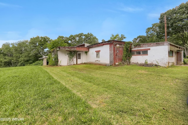 4792 Muncy Exchange Rd, Turbotville, PA 17772 - rear view of house with a yard