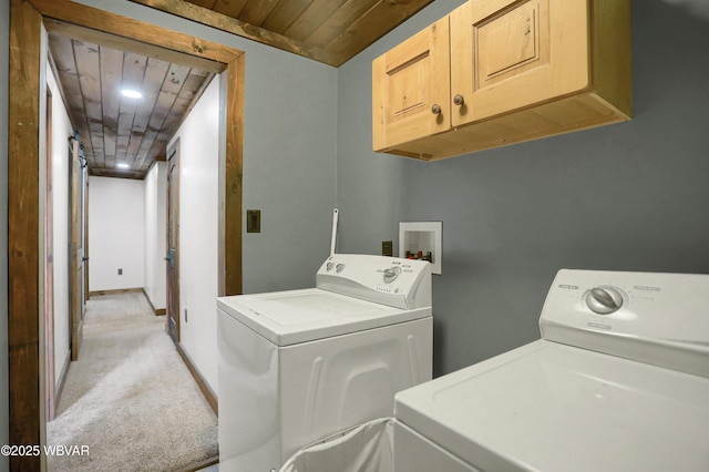 4792 Muncy Exchange Rd, Turbotville, PA 17772 - laundry area featuring washer and clothes dryer, wooden ceiling, light colored carpet, and cabinet space