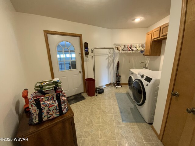 32 Chestnut Ct, Jersey Shore, PA 17740 - laundry area with washing machine and clothes dryer, light tile patterned floors, and cabinet space
