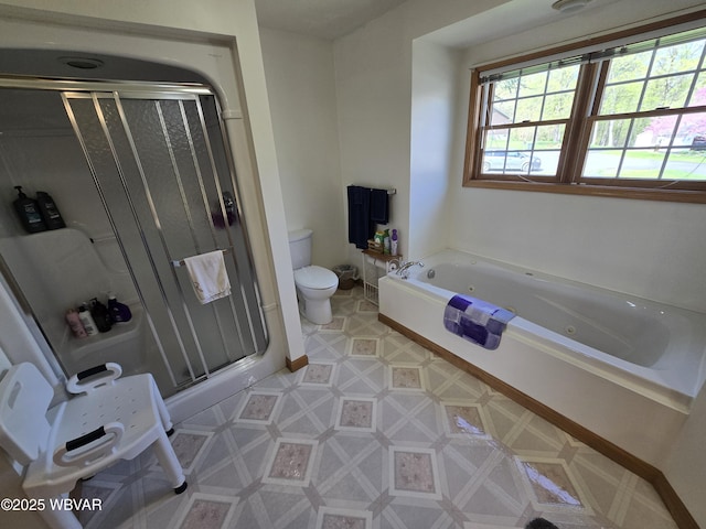 32 Chestnut Ct, Jersey Shore, PA 17740 - full bath with a whirlpool tub, baseboards, a stall shower, and toilet