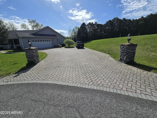 32 Chestnut Ct, Jersey Shore, PA 17740 - exterior space with an attached garage, decorative driveway, and a front yard