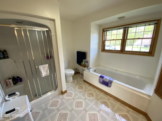 32 Chestnut Ct, Jersey Shore, PA 17740 - bathroom featuring a stall shower, toilet, and a garden tub