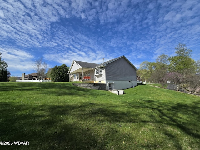 32 Chestnut Ct, Jersey Shore, PA 17740 - view of side of home featuring a yard
