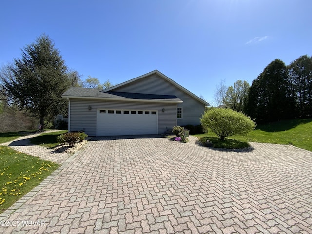 32 Chestnut Ct, Jersey Shore, PA 17740 - view of side of property with a garage and driveway