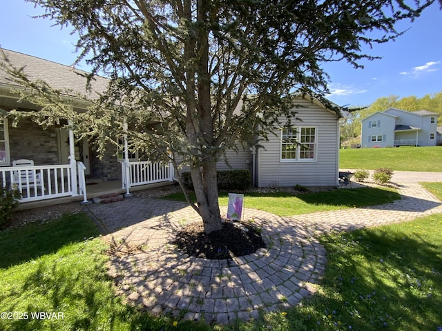 32 Chestnut Ct, Jersey Shore, PA 17740 - exterior space featuring covered porch and a yard