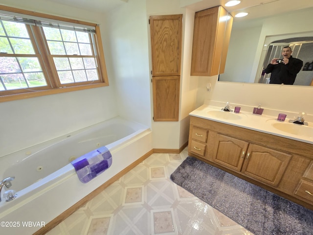 32 Chestnut Ct, Jersey Shore, PA 17740 - bathroom with a sink, tile patterned floors, a tub with jets, and double vanity