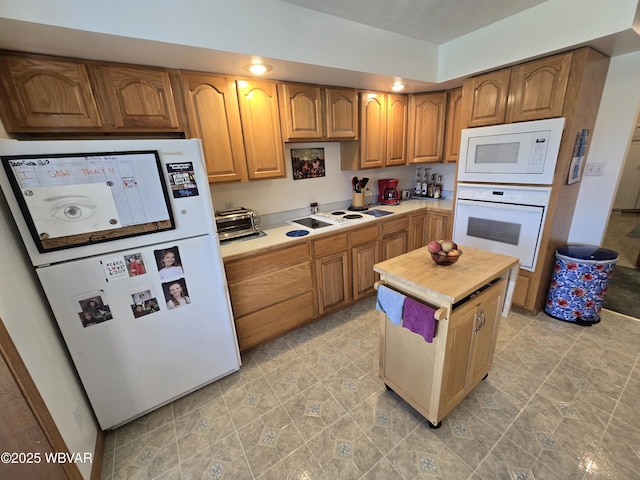 32 Chestnut Ct, Jersey Shore, PA 17740 - kitchen featuring white appliances, brown cabinets, butcher block countertops, and a toaster