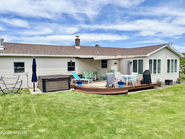 15 Hillview Ave, Williamsport, PA 17701 - rear view of house featuring a hot tub, a deck, a chimney, a lawn, and roof with shingles