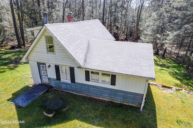 view of front of home with a front yard